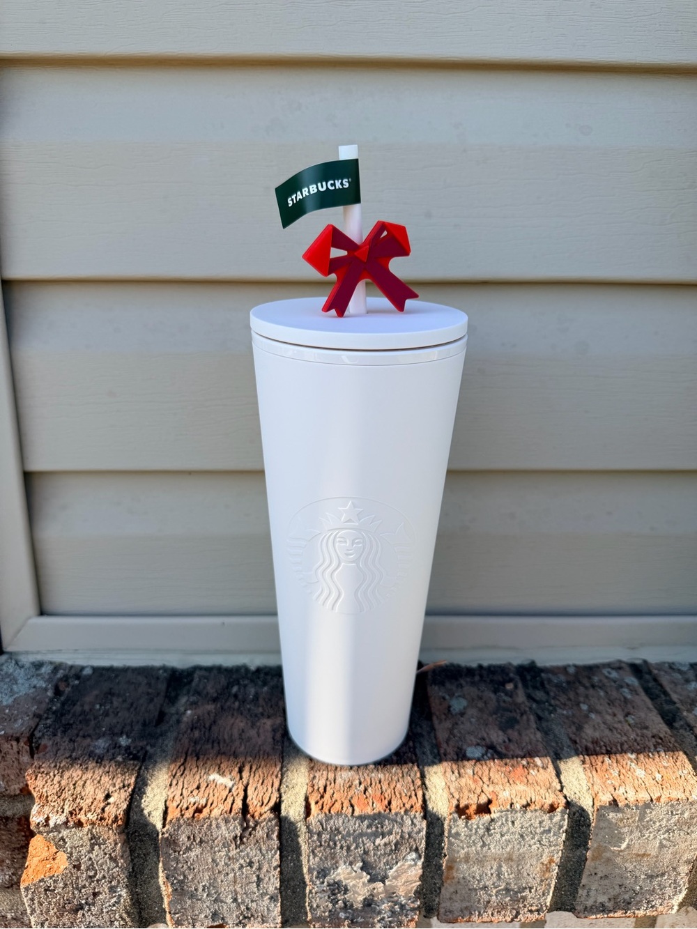 Starbucks White Tumbler with Red Bow and Green Flag Accent